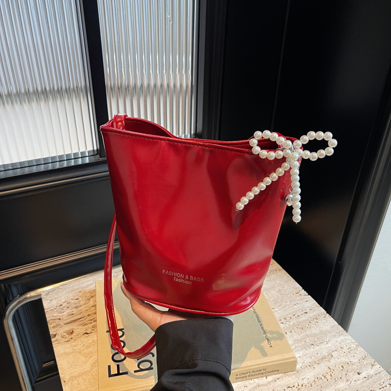 Niche Design Bucket Bag Women 2025 New High Quality Handbag Versatile Fashion Glossy Solid Crossbody Bag - Image 3
